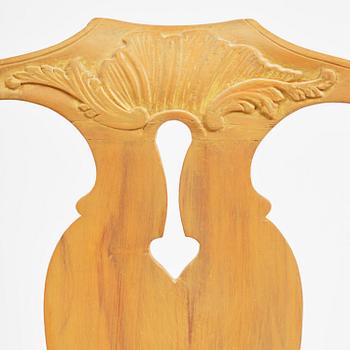 A pair of rococo open-back armchairs, Stockholm, later part 18th century.