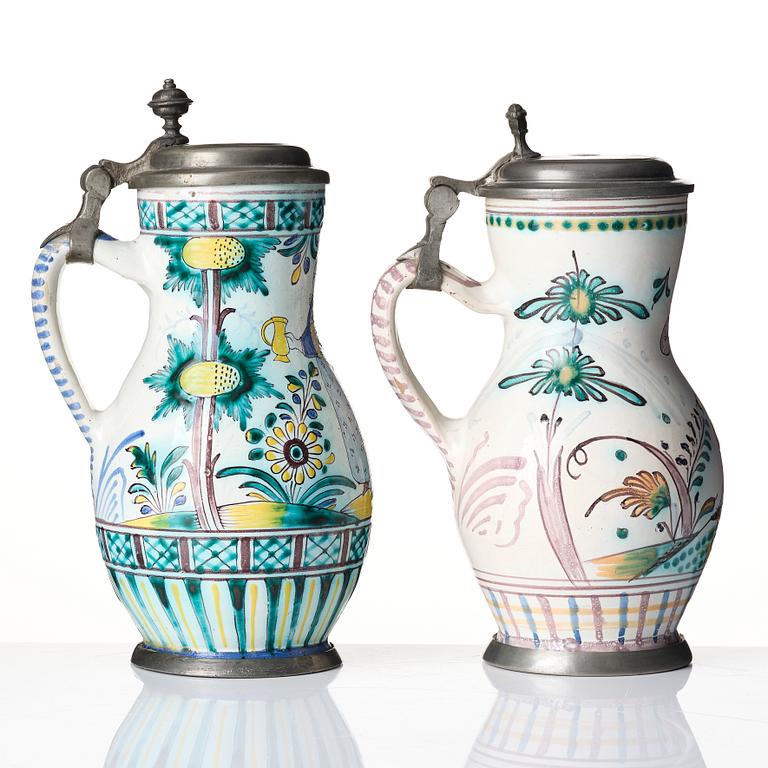 Two Dutch faience tankards with pewter lids, Delft, 18th century.