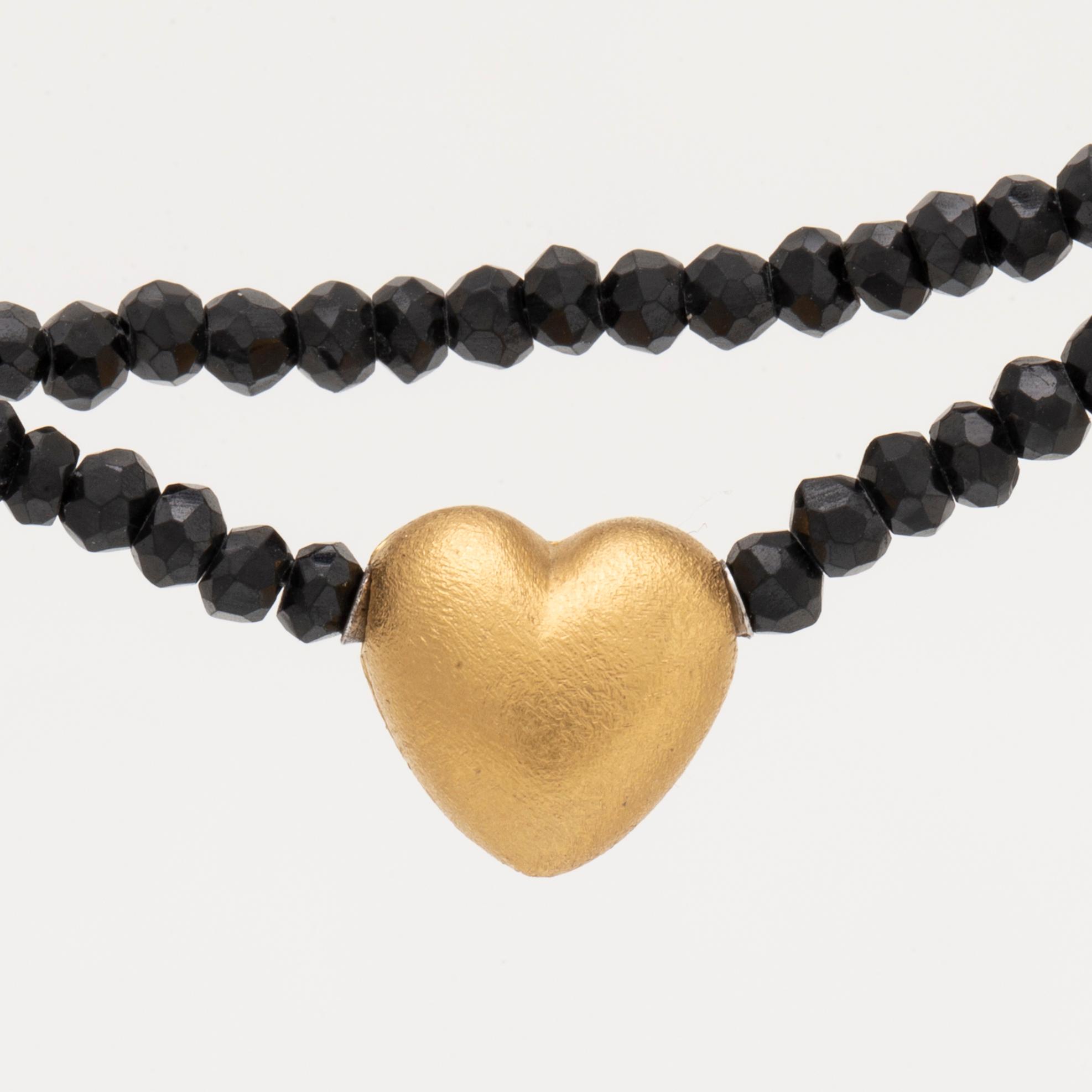 Ole Lynggaard, necklace faceted onyxbeads and clasp 18K gold, dustbag and original case.