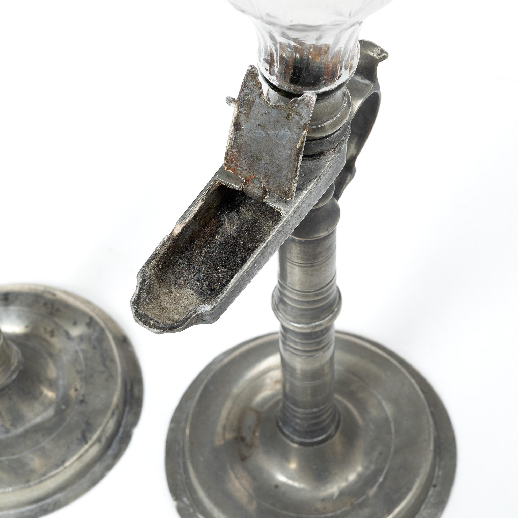 Oillamps, two similar, 19th century.