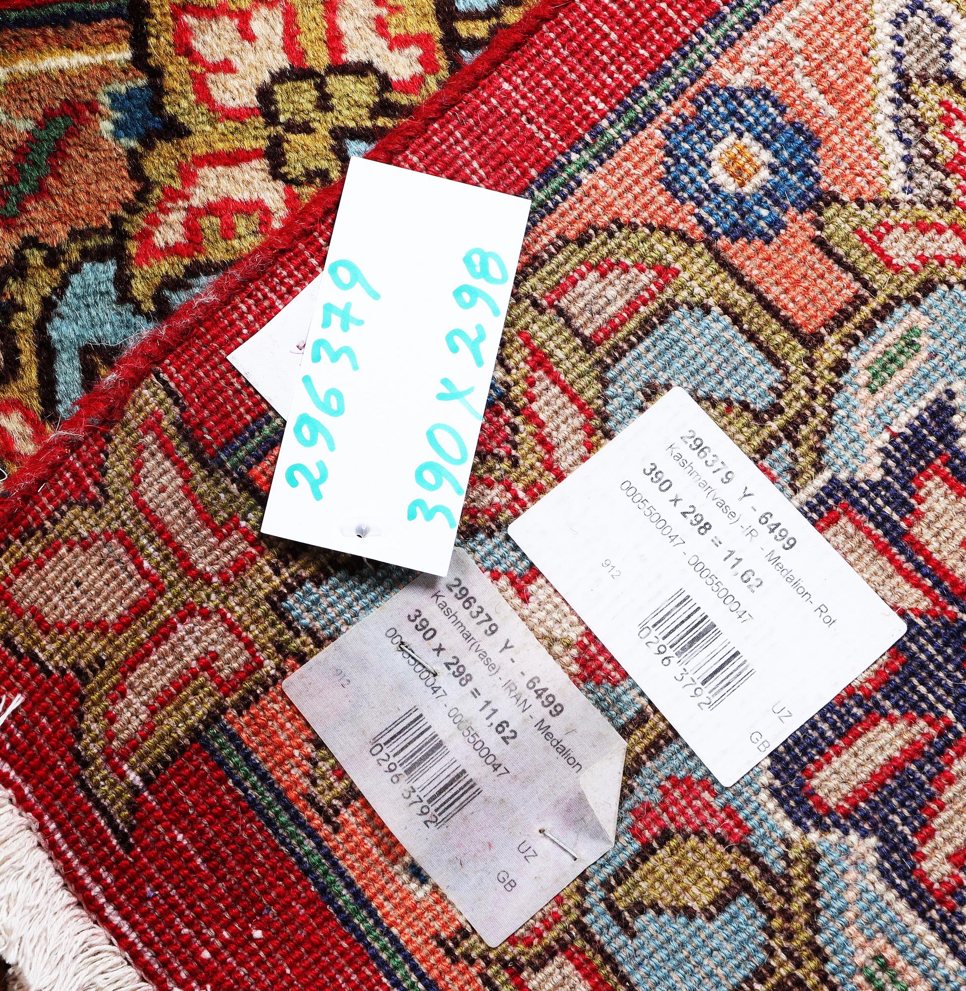 A Kashmar carpet, c. 390 x 298 cm.