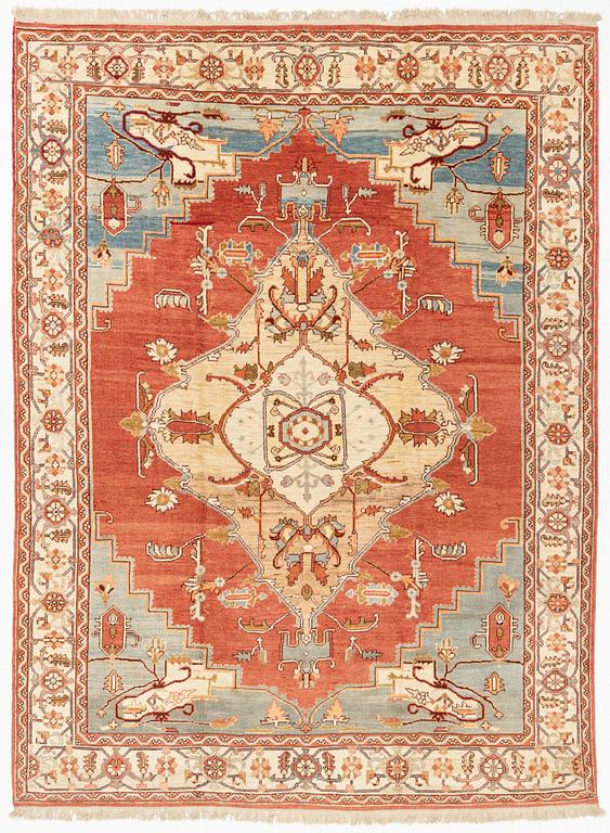 A Heriz design carpet 393 x 293 cm.