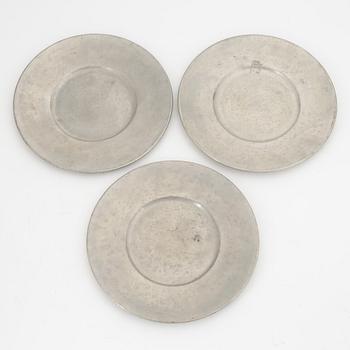 A group of 10 pewter coasters and 3 dishes, Firma Svenskt Tenn, 1948 and 1946.