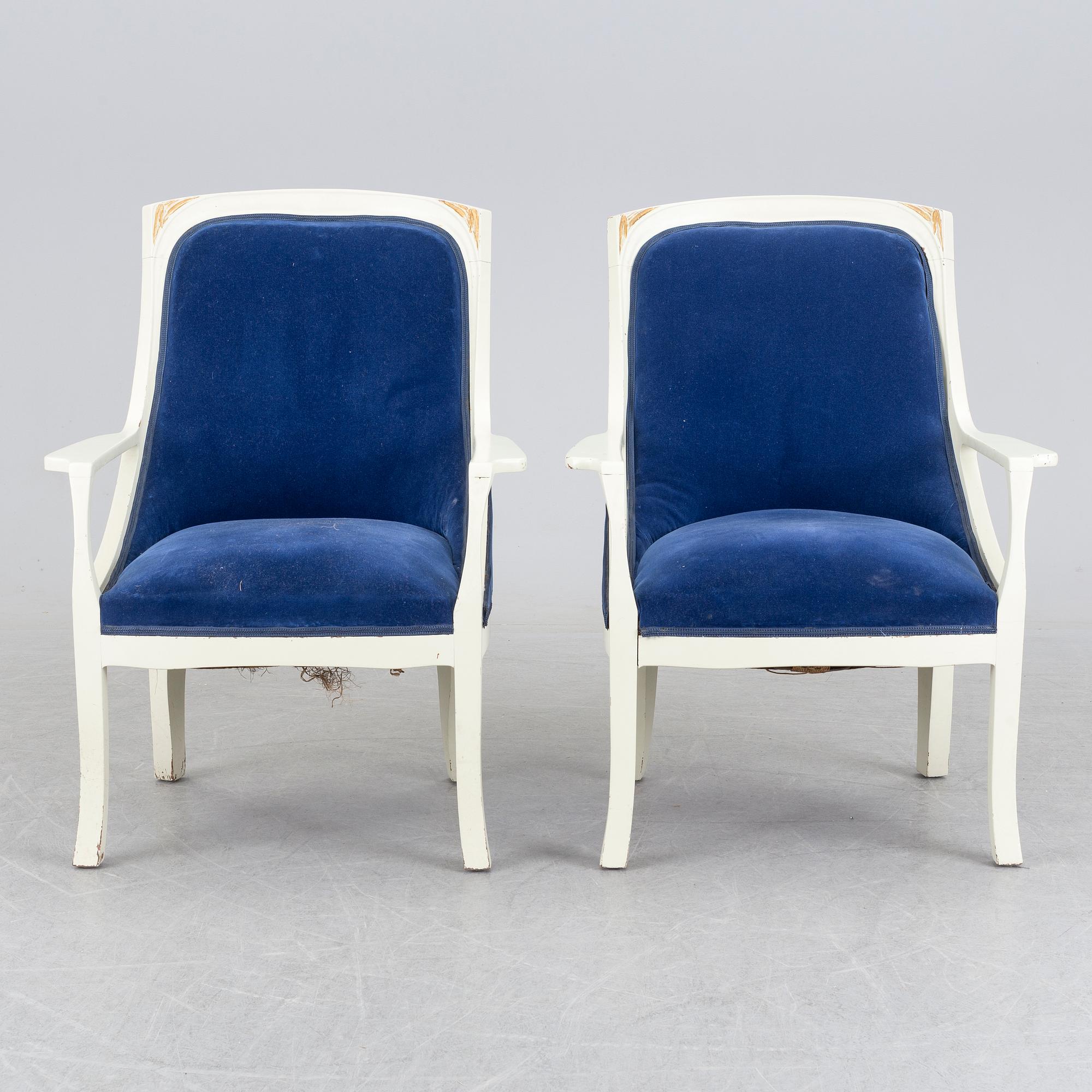 A pair of art nouveau armchairs.