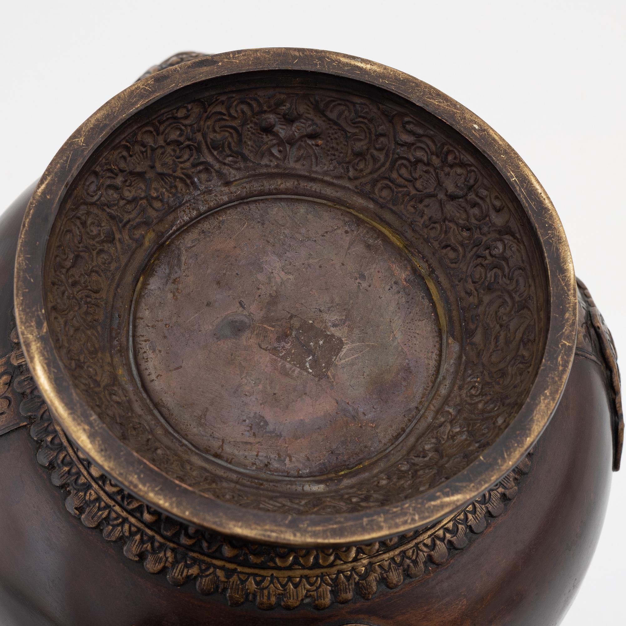 A Tibetan brass/copper teapot, circa 1900.