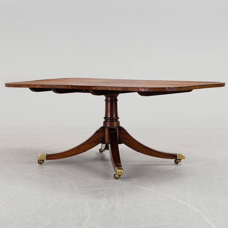 A SOFA TABLE, probably England, second half of the 20th century.