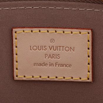 LOUIS VUITTON, a powder pink vernis top handle bag with a detachable Louis Vuitton charm, "Alma".