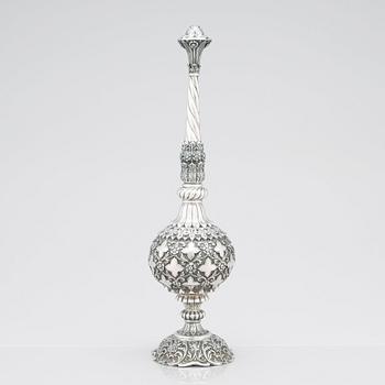 An 1880's british Raj repoussé silver rosewater sprinkler by Oomersi Mawji & Sons.