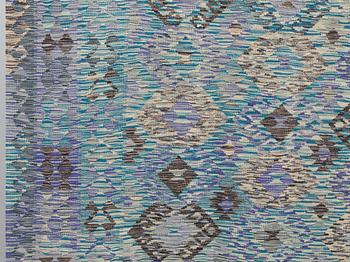 A kilim carpet, c 341 x 257 cm.