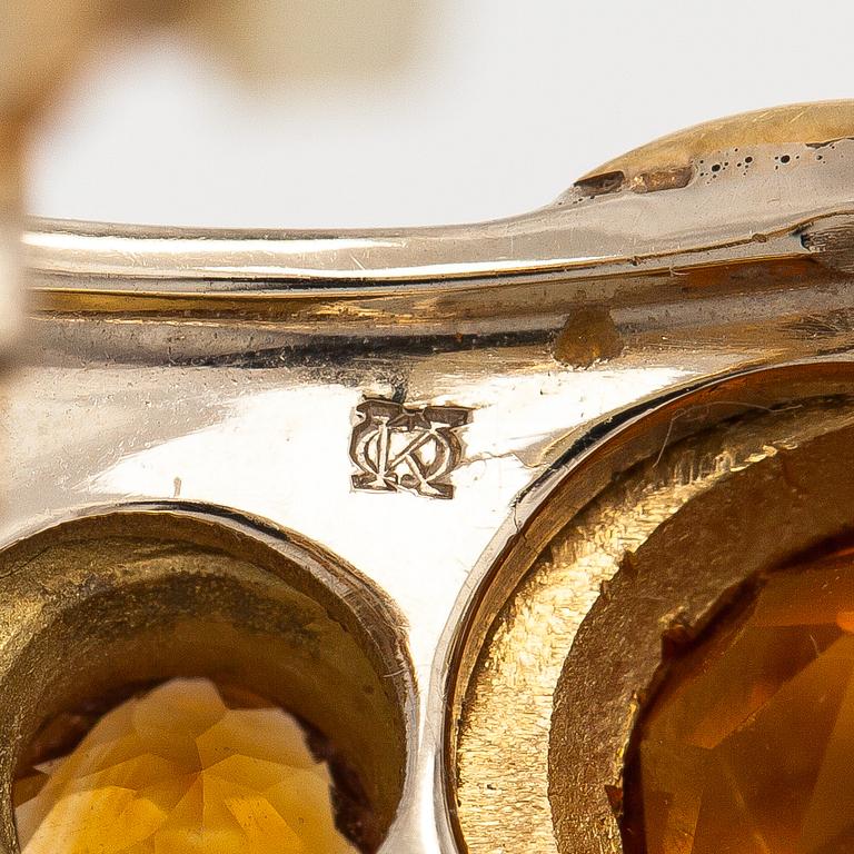 Korvakorut, "Callista", 18K kultaa, terästä, viistehiotut sitriinit, Kaufmann de Suisse.