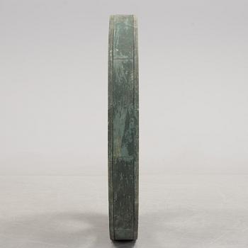 A early 20th century wooden wheel.