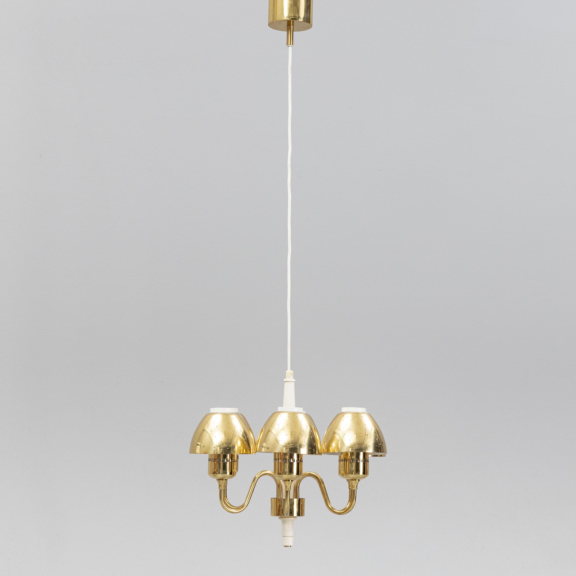 Hans-Agne Jakobsson, a 'T526' brass and wood ceiling light from Markaryd.