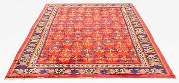 An East Turkestan silk carpet, ca 308 x 182 cm.
