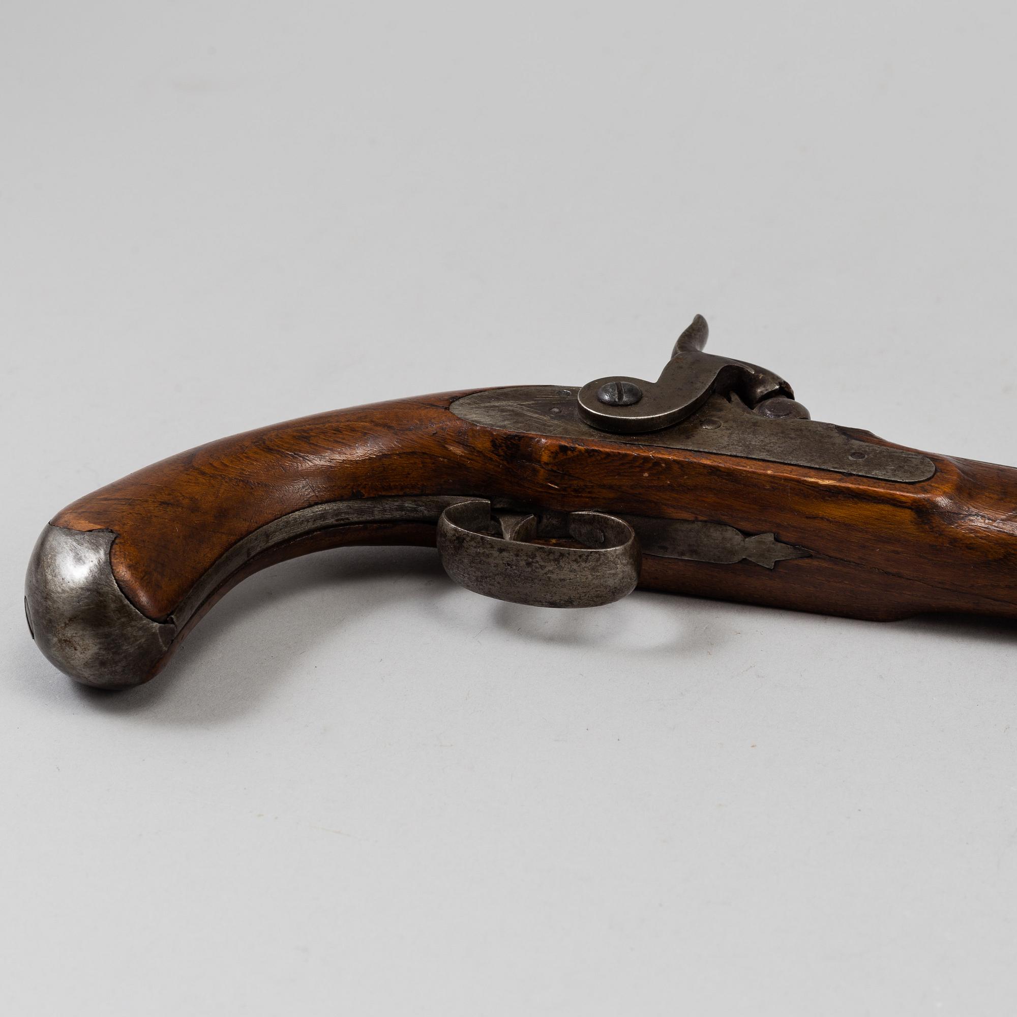 One flint lock postol, late 18th ct, and one percussion pistol, 19th ct.