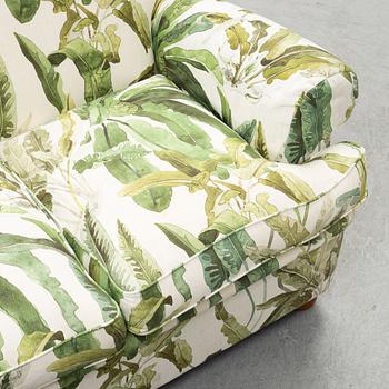 A model 703 sofa by Josef Frank for Firma Svenskt Tenn.