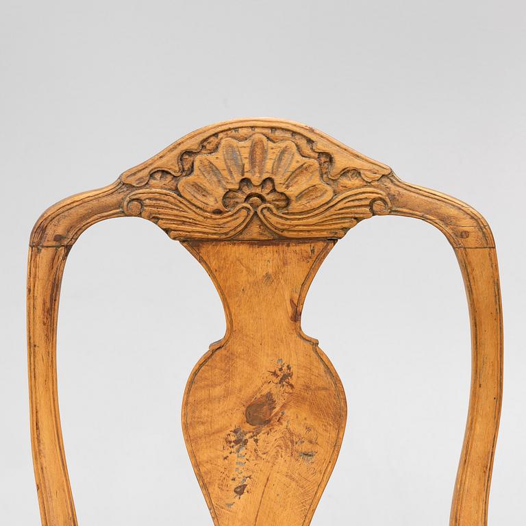 An assembled suite of ten rococo chairs, Western Sweden, later part 18th century.