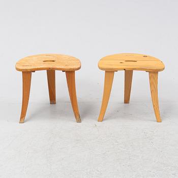 A pair of pine stools by Rune Larssson Ambjörby.