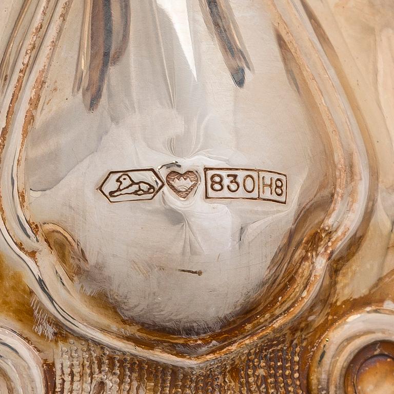 A silver candelabra and a pair of silver candlestick, Kultakeskus Hämeenlinna 1962 and 1985.