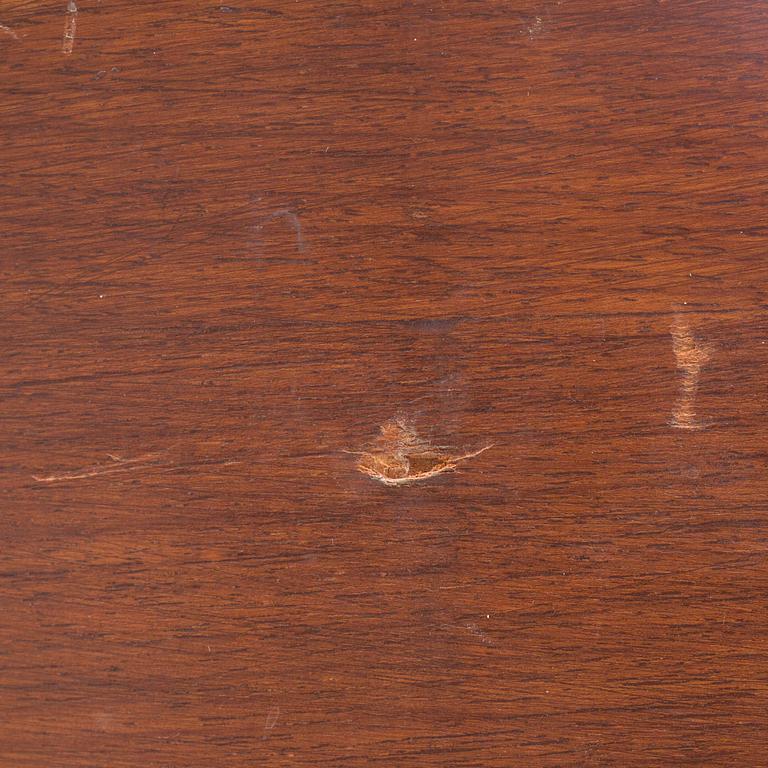 An easy chair and ottoman by Charles & Ray Eames, Herman Miller, USA, produced with licence by Hille, London.