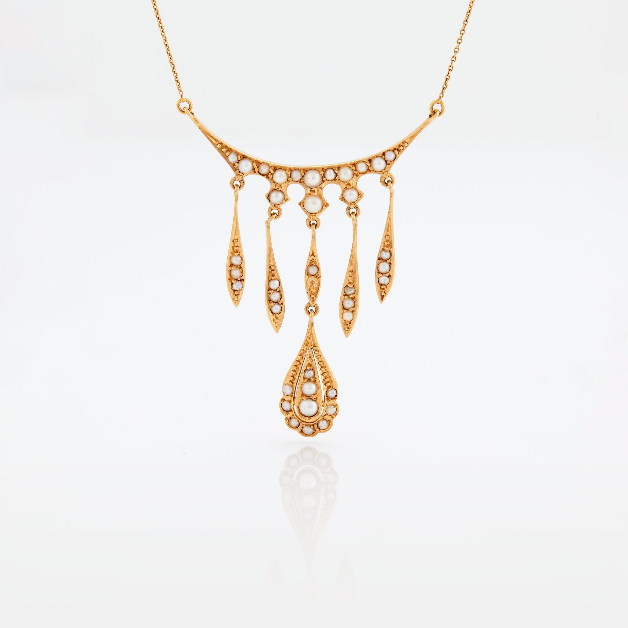 COLLIER med seedpärlor.