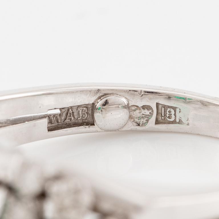 A W.A. Bolin ring 18K white gold with an emerald-cut emerald and brilliant-cut diamonds.