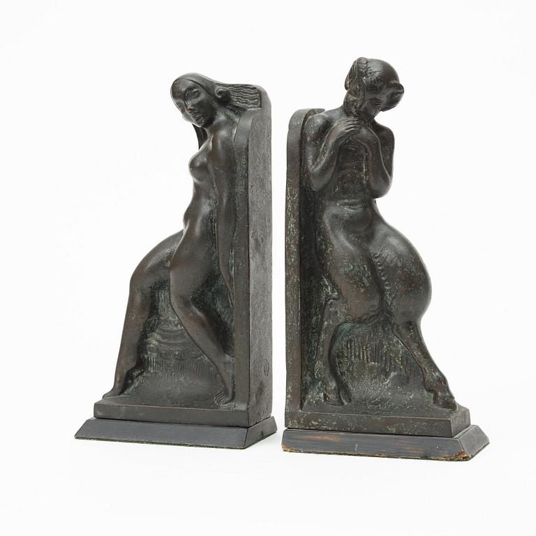 A pair of Axel Gute patinated bronze bookends, Sweden 1929.