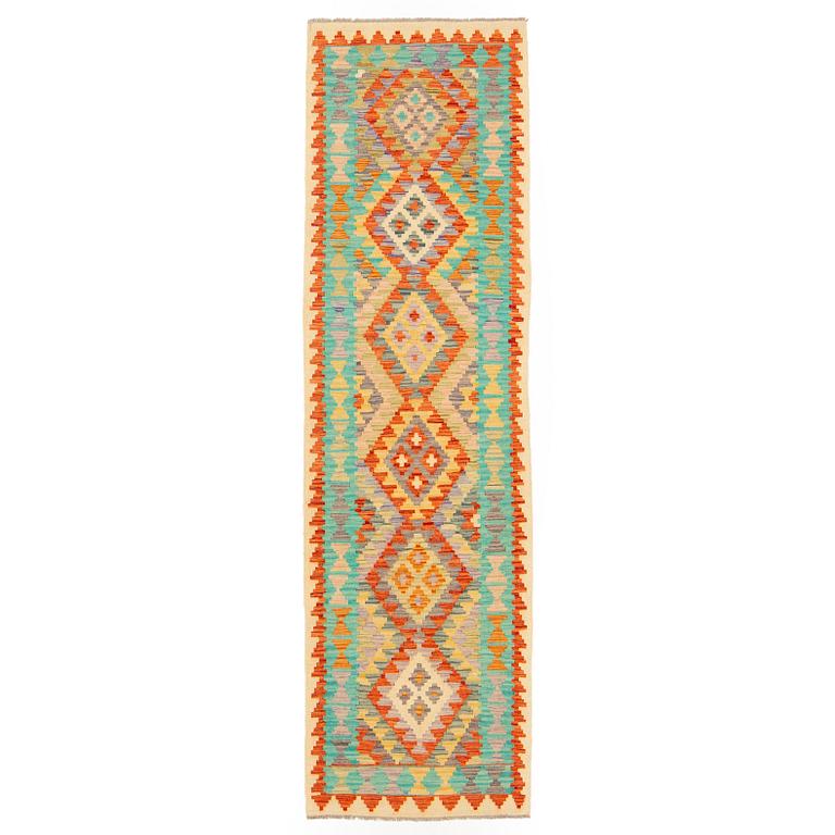 A kilim runner, c 300 x 85 cm.