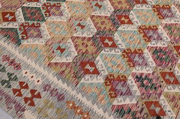 A Kelim rug, c. 296 x 201 cm.