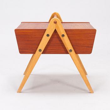 A 1950's sewing table in teak.