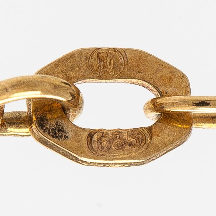 Kalevala Koru, hänge och ked, 14K guld, peridot, 2017.
