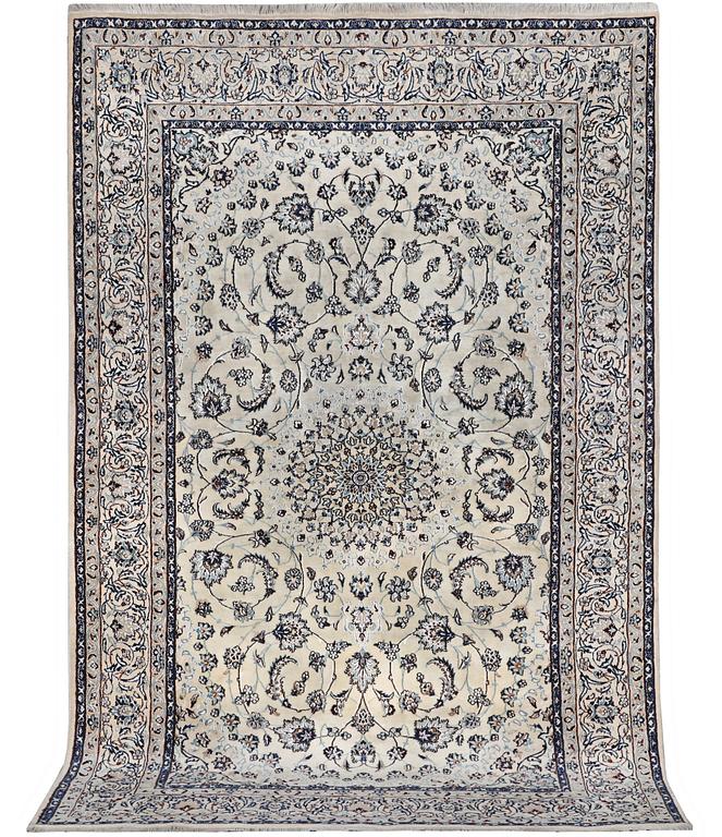 A carpet, Nain, part silk, 6 laa, c. 294 x 193 cm.