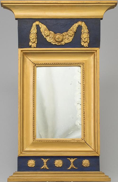 An early 19th century empire mirror.