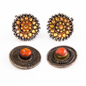 A pair of Indian silver ear buttons and buttons before 1960:s.