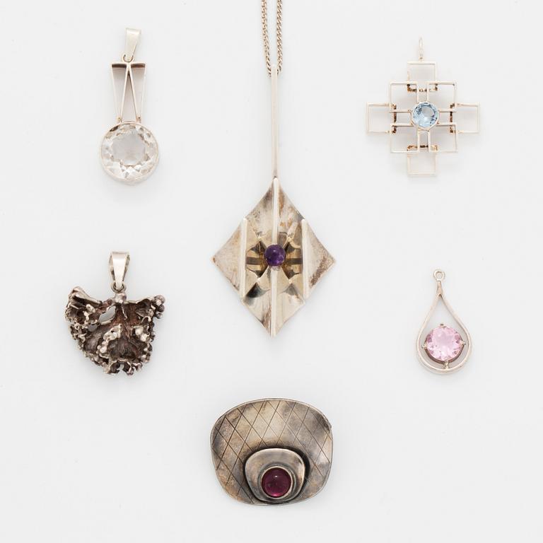 Five pendants and one brooch, silver.