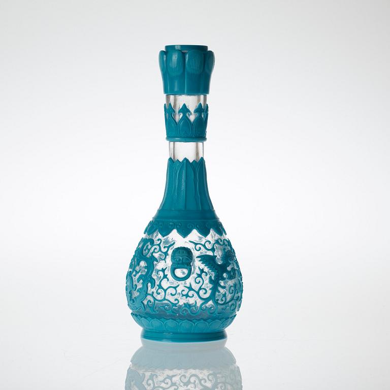 A Chinese turkoise Peking glass vase, inscription to base.