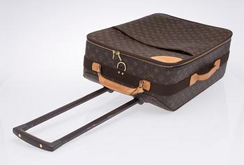 A Monogram Canvas Pégase 55 Suitcase with a Garment Cover.