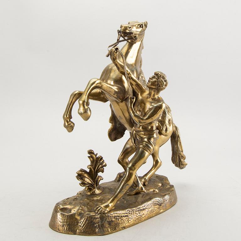 A bronze sculpture after Guillaume Coustau.