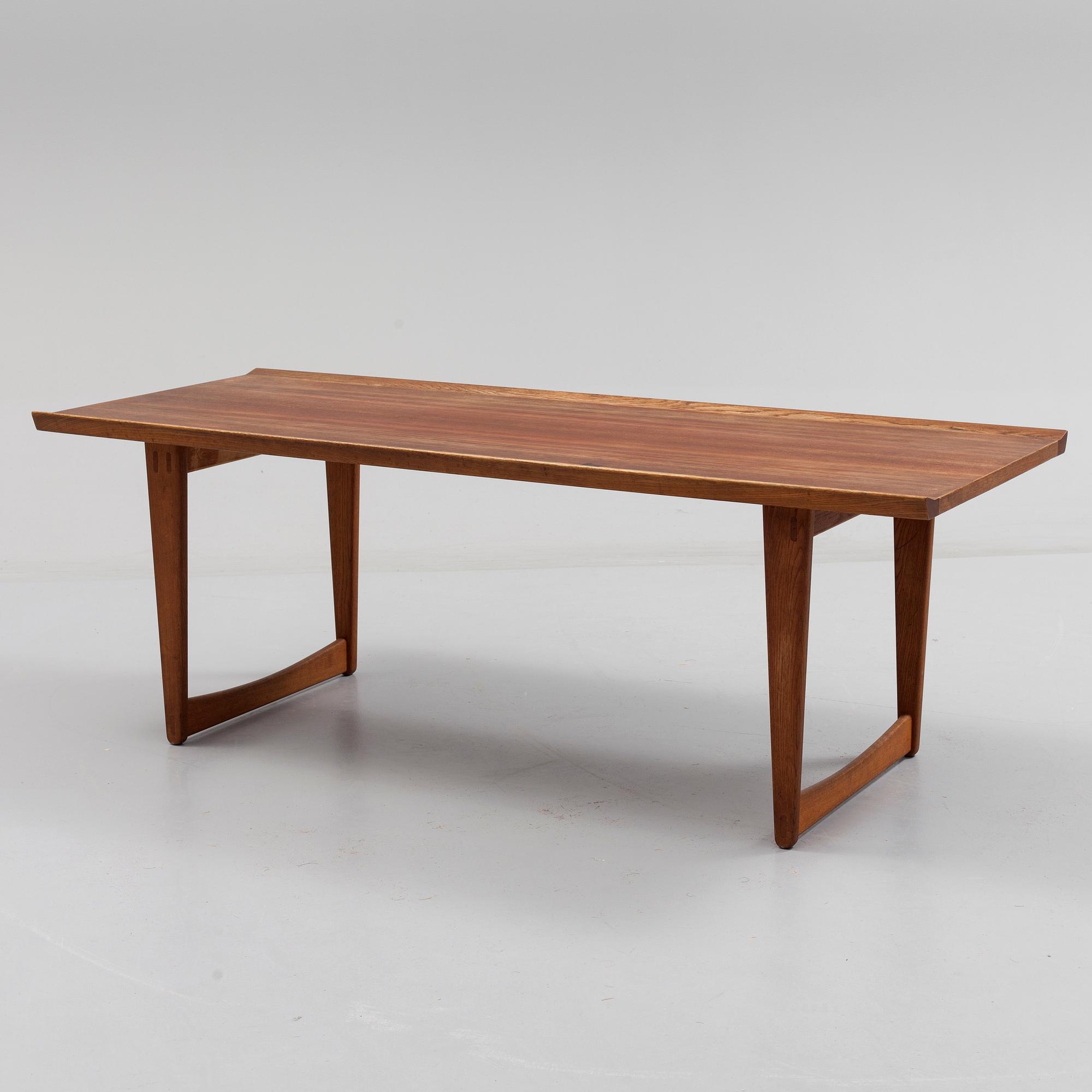1960s Yngve Ekström coffee table veneered with teak and oak.