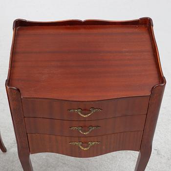 A pair of Rococo style bedside tables, second half of the 20th Century.