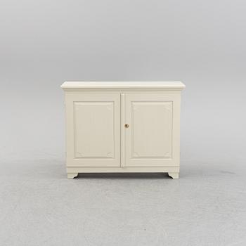A painted 20th Century cupboard.