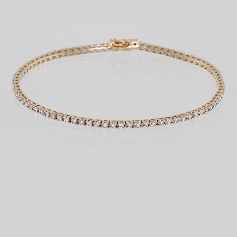 ARMBAND, 18K guld med briljantslipade diamanter 0.97 ct. Vikt 7,4 gram.