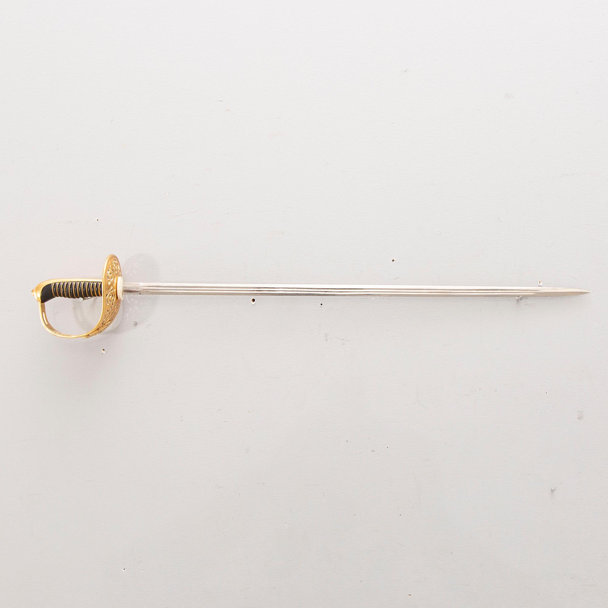 A cavalry officer's sword, 1893 pattern, with scabbard.