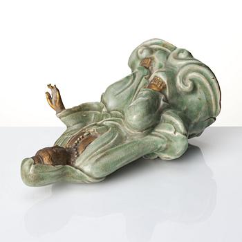 A seated celadon figure of Guanyin, presumably Longquan Ming dynasty, 17th Century.