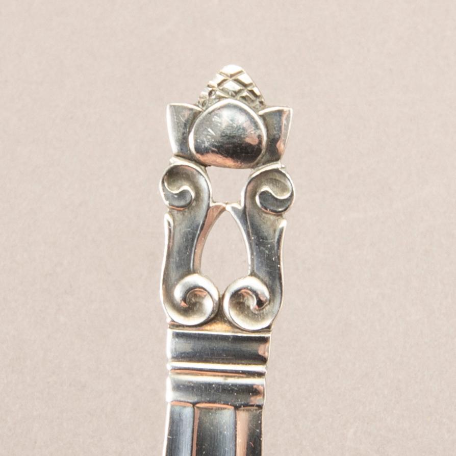 Johan Rohde, a set of 79 pcs of "Konge/Acorn" sterling silver flatware, maker's mark Georg Jensen, Copenhagen post 1945.