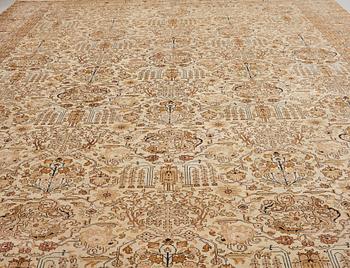 A CARPET, a semi-antique Tabriz, ca 593,5 x 398,5 cm, signed Nämatzade.