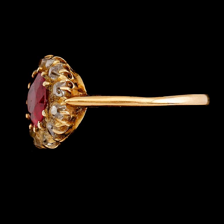 RING, 18 k guld, diamanter och röd sten. Total vikt 3 g.