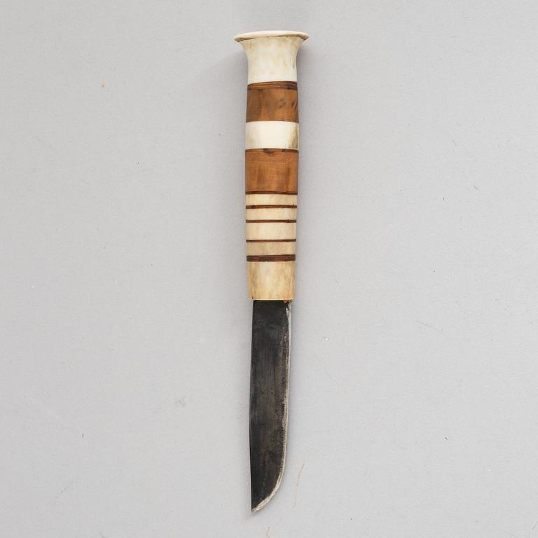 Lars Pirak, a reindeer horn knife, signed.