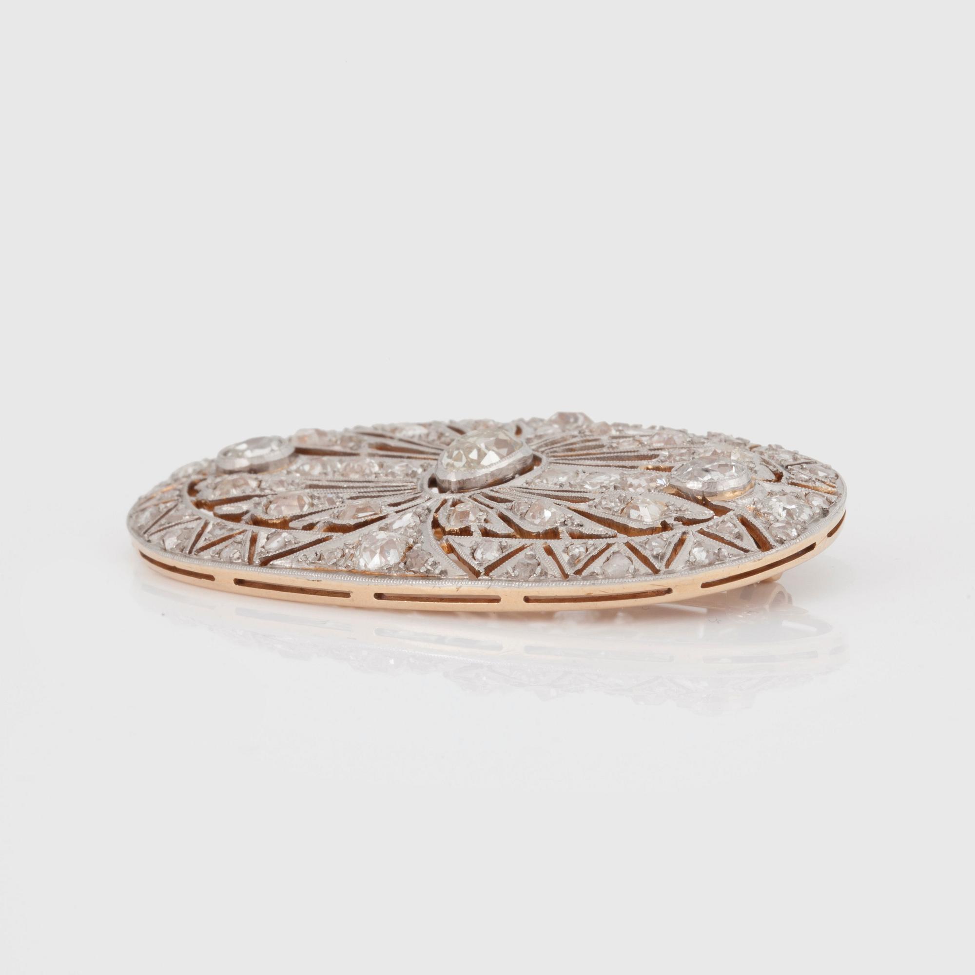 BROSCH med rosen- samt gammalslipade diamanter.