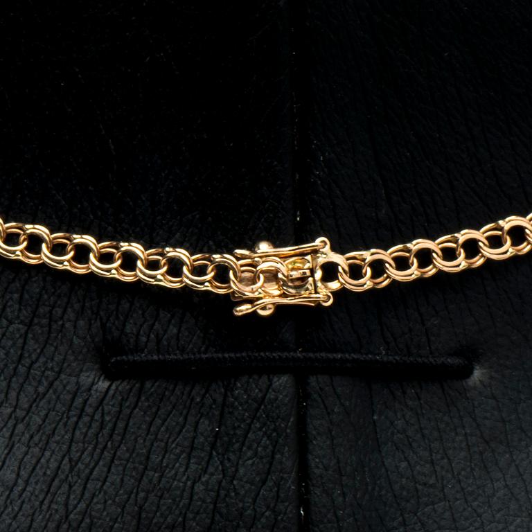 HALSKED och ARMKED, 14K guld. Finska kontrollsstämplar. Vikt totalt ca 11,6 g.