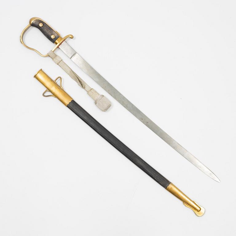 A Swedish police sabre with scabbard, drom around the year 1900.